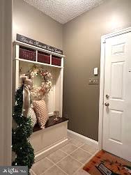 mudroom featuring tile flooring