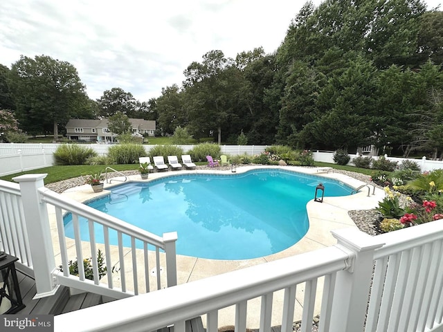 view of pool featuring a patio area