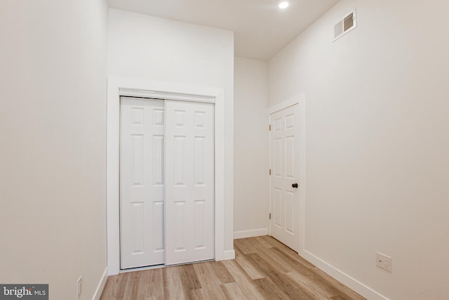 hallway featuring light hardwood / wood-style floors