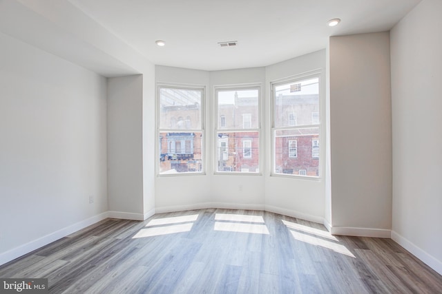 empty room featuring light hardwood / wood-style floors