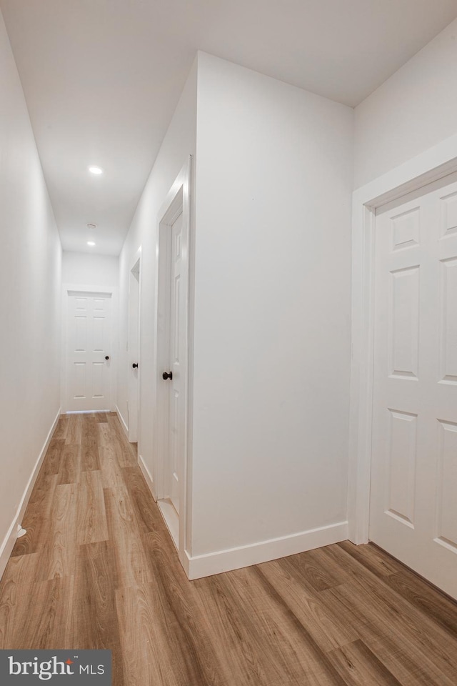 corridor featuring light wood-type flooring