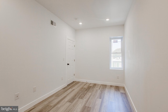 unfurnished room featuring light hardwood / wood-style floors