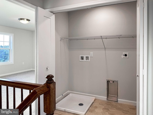 laundry area featuring washer hookup and electric dryer hookup