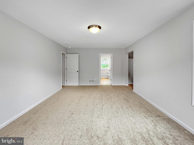 unfurnished bedroom featuring carpet flooring