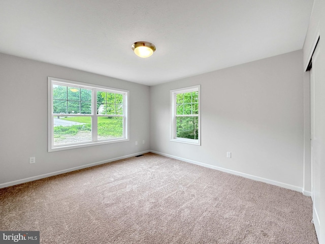 view of carpeted spare room