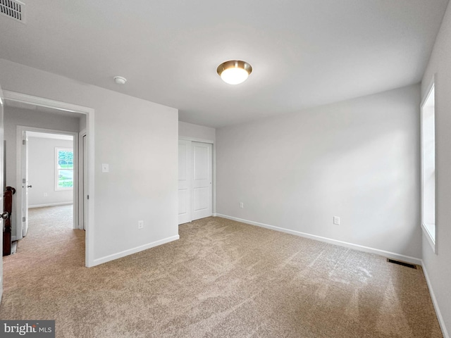 view of carpeted spare room