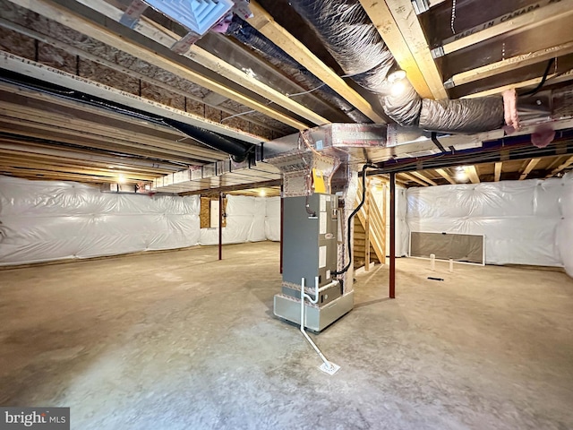 basement featuring heating unit