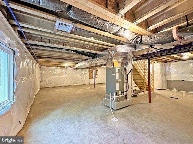 basement featuring heating unit