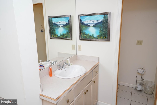 bathroom with tile patterned flooring and vanity