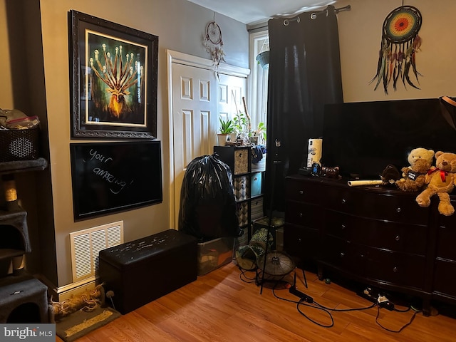 bedroom featuring light wood-type flooring