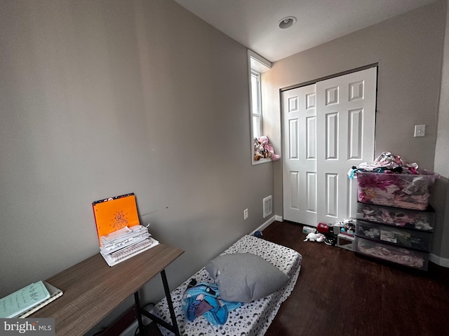 miscellaneous room with dark hardwood / wood-style flooring