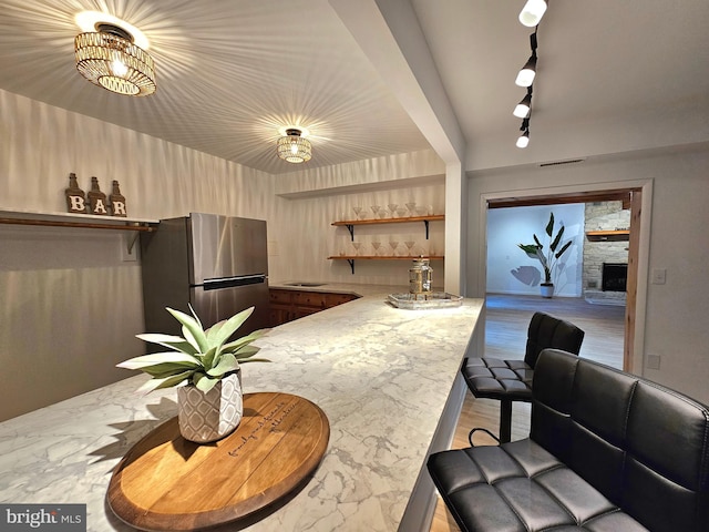 dining room featuring a fireplace