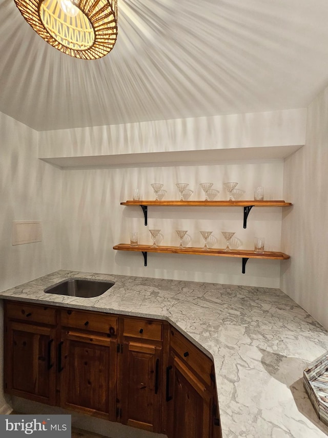 kitchen featuring light stone counters