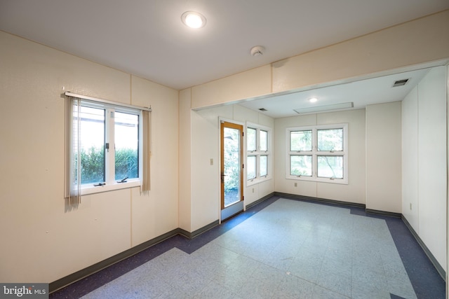 view of tiled spare room