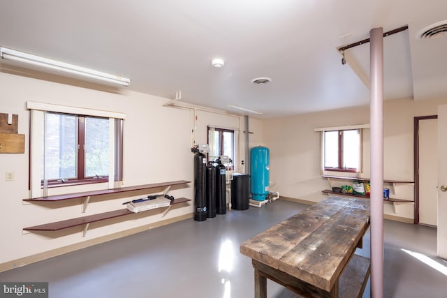 workout area featuring concrete flooring