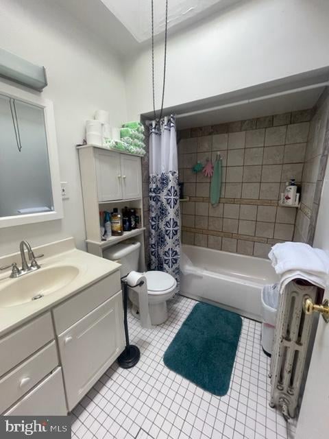 full bathroom featuring shower / tub combo with curtain, tile flooring, toilet, and vanity