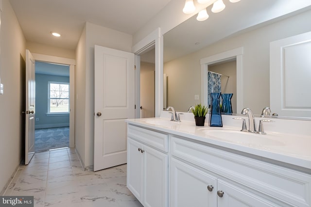 bathroom featuring double sink, tile flooring, and large vanity