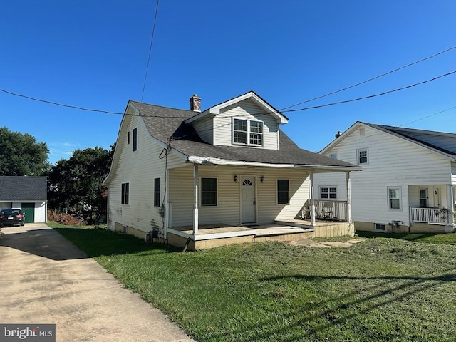 view of front of property featuring a porch and a front lawn