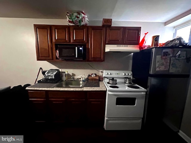 kitchen featuring appliances with stainless steel finishes and sink