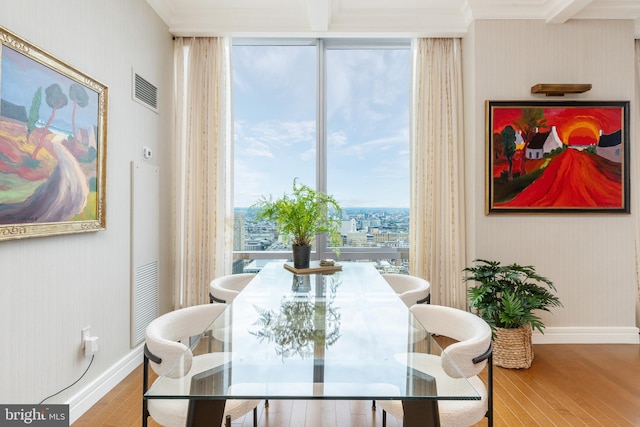 dining area with light hardwood / wood-style floors