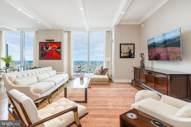 living room with floor to ceiling windows, light hardwood / wood-style floors, ornamental molding, and beam ceiling