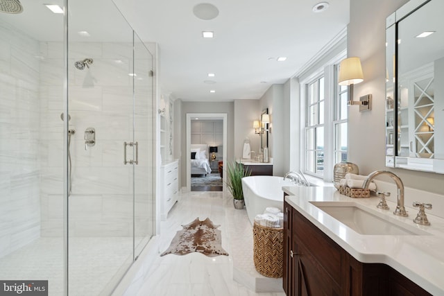 bathroom featuring tile floors, a shower with door, and large vanity