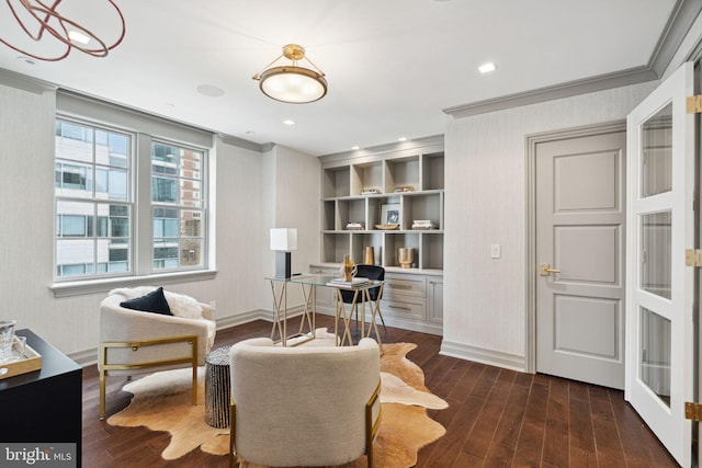 living area with ornamental molding, french doors, and dark hardwood / wood-style flooring