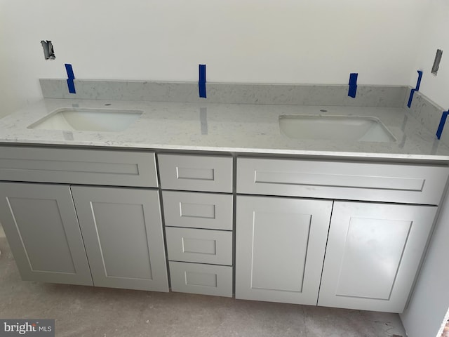 bathroom with double vanity