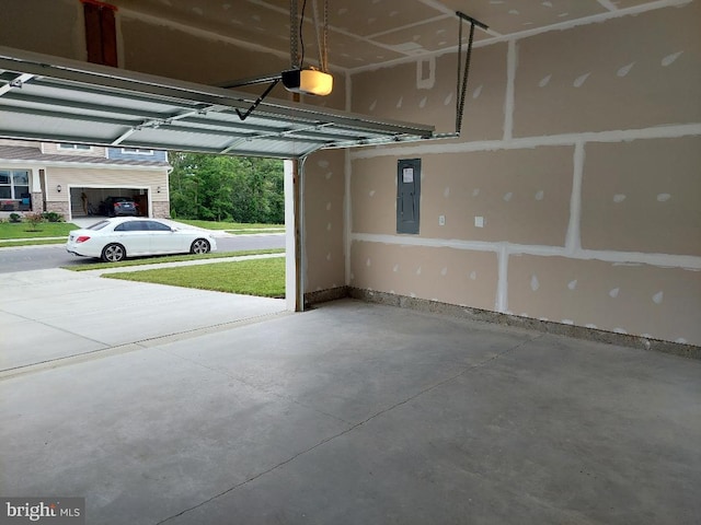 garage with a carport and a garage door opener