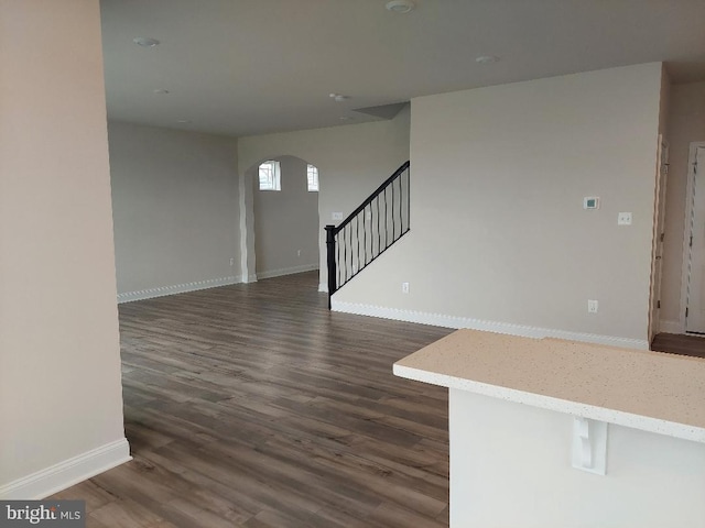 interior space with dark hardwood / wood-style flooring