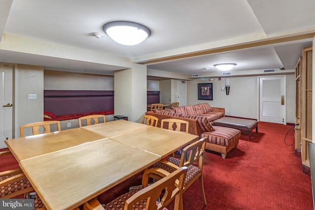 view of carpeted dining area