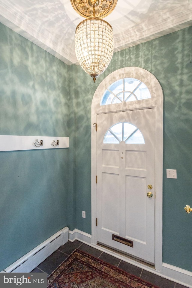 entrance foyer with tile floors and a baseboard radiator