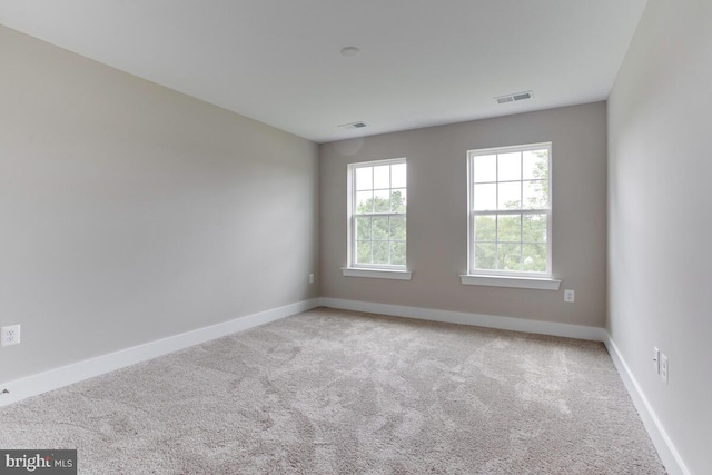 view of carpeted spare room