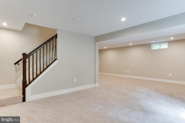 basement with light carpet