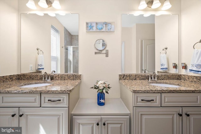 bathroom featuring dual sinks and oversized vanity