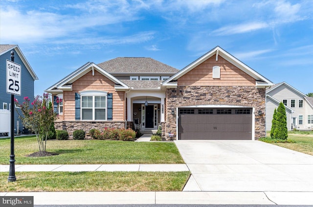 craftsman inspired home with a front lawn and a garage