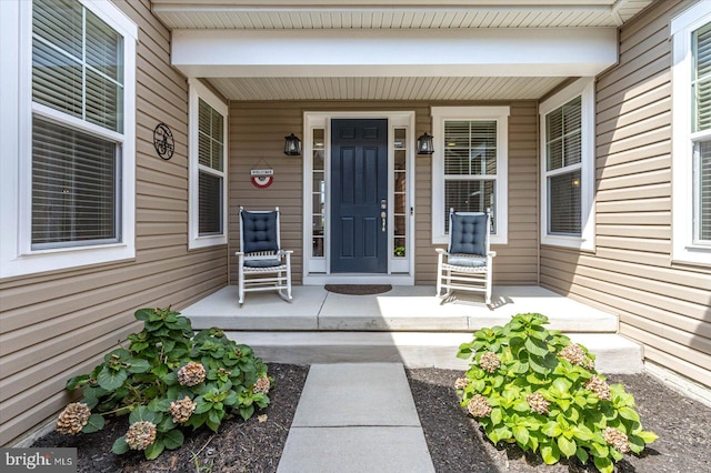 entrance to property with a porch