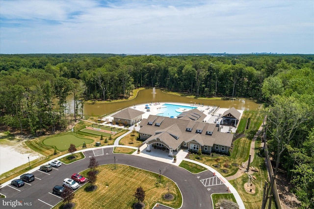 birds eye view of property with a water view