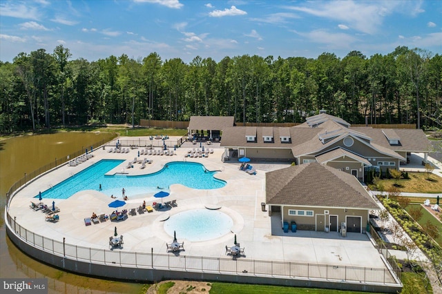 view of swimming pool with a patio area