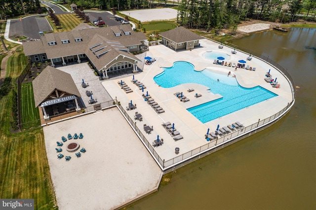 birds eye view of property featuring a water view