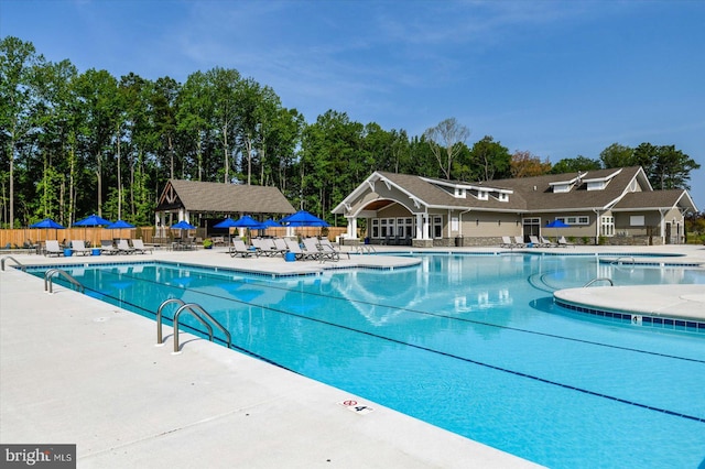 view of swimming pool with a patio area