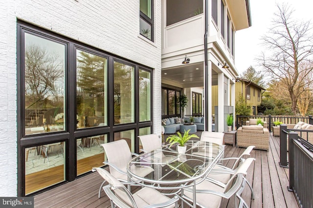 wooden deck with outdoor lounge area