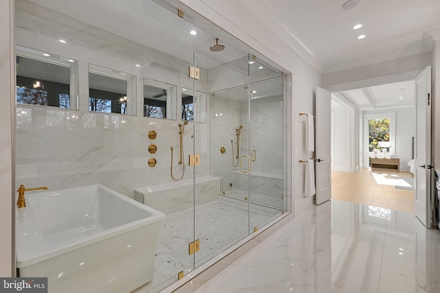 bathroom featuring crown molding, sink, and independent shower and bath