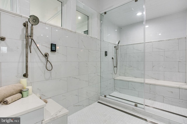 bathroom with a shower with shower door