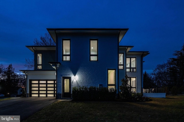 view of front of property with a garage