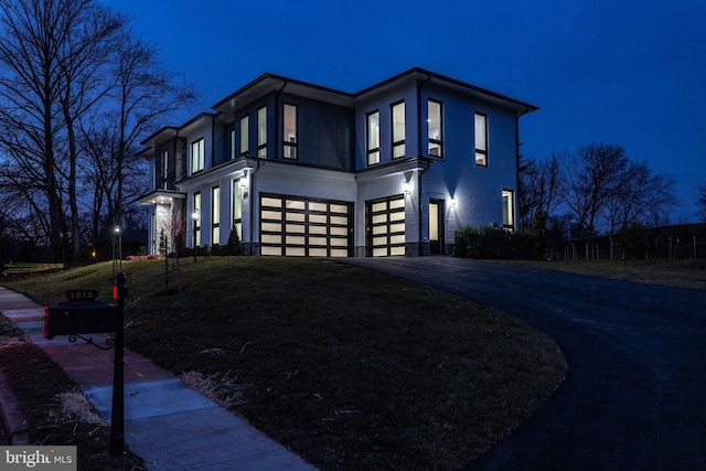 view of front of home with a garage