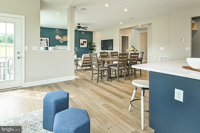 interior space featuring ceiling fan and light hardwood / wood-style flooring