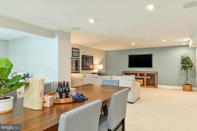 view of carpeted dining area