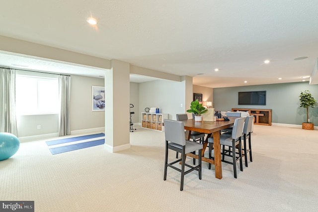 view of carpeted dining room