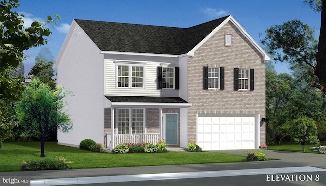 view of front facade with a front yard and a garage